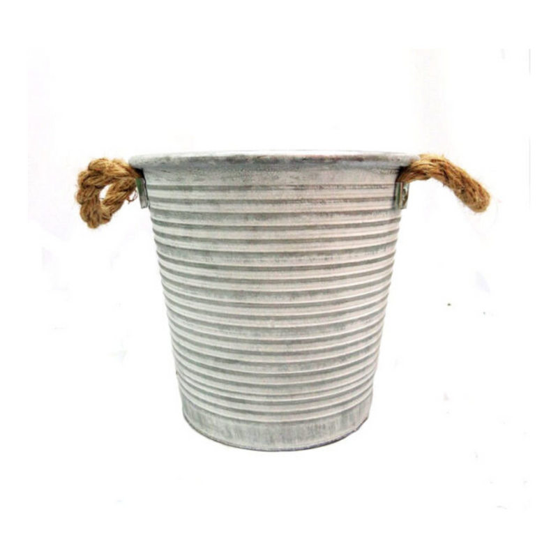 Elevate your home decor with the vintage charm of Somerset Bucket. This versatile antique pot is perfect for both indoor and outdoor use, allowing you to add a touch of history and style to any space. With its spacious 21.5cm x 16cm x 20cm size, it&